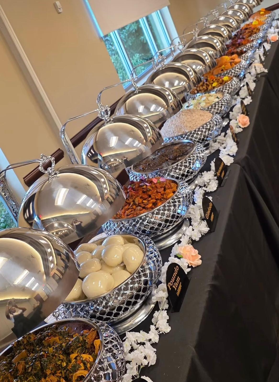 Silver chafing dish buffet line at a catered event