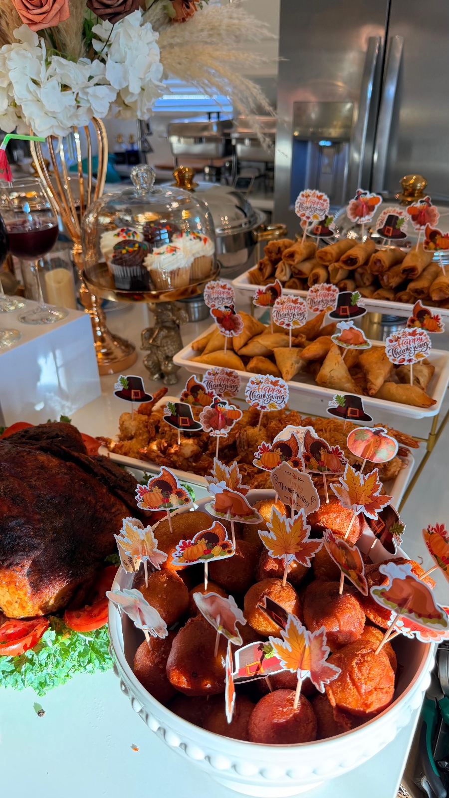 Small chops and dessert display at a catered celebration